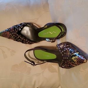 Nina Heels, 9.5 med. Normal wear/tear but not much.